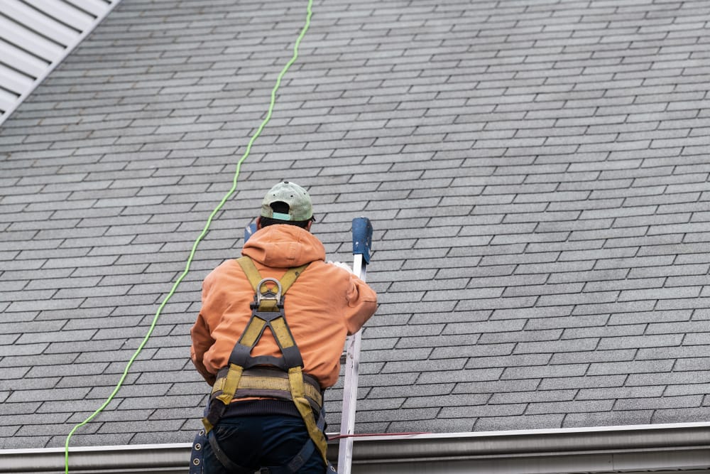 roofing contractor performing work on a roof.